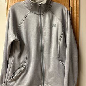 The North Face light fleece lined jacket. Some signs in wear (picture below)